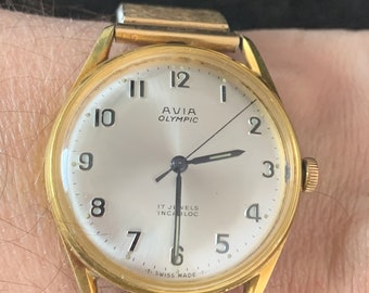 Prachtig Vintage Gents AVIA OLYMPIC 17 JEWELS swiss made incabloc horloge Verguld plaque g10