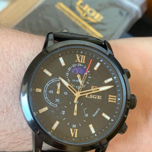 Montre chronographe Lige avec cadran jour/nuit, boîtier noir, cadran noir