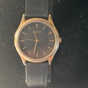 Sekonda gents quartz black faced dress watch gold plated