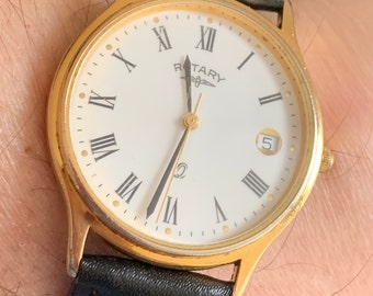 Vintage unisex 34mm Gold Plated Rotary Quartz Watch with the date at the 3 AF