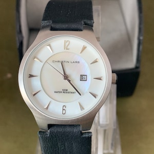 Unisex Christin Lars Stainless Steel dress watch on Leather strap Boxed