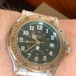Vintage Rotary Swiss Commando military style watch with steel case, Black Dial