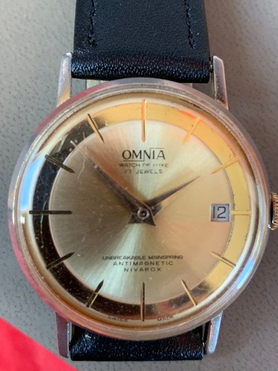 Vintage c1960s Omnia De Luxe 17 jewels, rare, Gold dial watch                                                                      . View 3