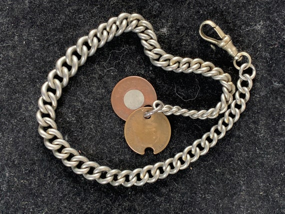 Antique White Metal Albert chain with coins/ tokens