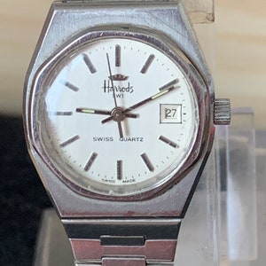 Vintage  Ladies Harrods All Steel Silver tone by Fortis with  Date  on adjustable Bracelet strap                                        .