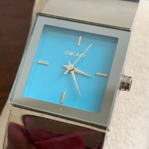 Ladies Pale Blue Dial Stainless steel Cuff Bracelet Wristwatch by DKNY (Mod NY-4825)