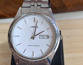 Vintage Lorus Seiko Analog Day Date Watch- V733-0A10 AF - Etsy Vintage Lorus Seiko Analog Day Date Watch- V733-0A10 AF - Etsy