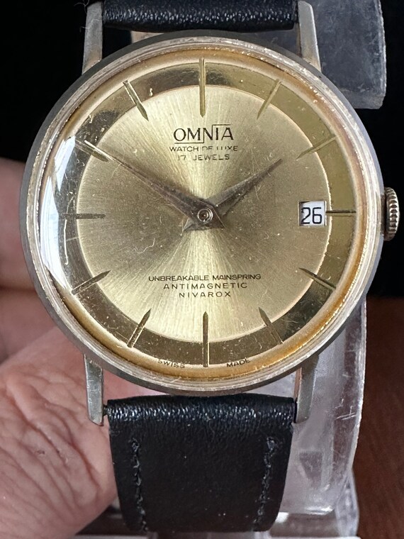 Vintage c1960s Omnia De Luxe 17 jewels, rare, Gold dial watch                                                                      . View 4