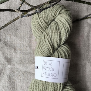 Botanically dyed natural plant dyed wool yarn  in pale green. DK (double knit) yarn Suitable for knitting tablet weaving, nalbinding.