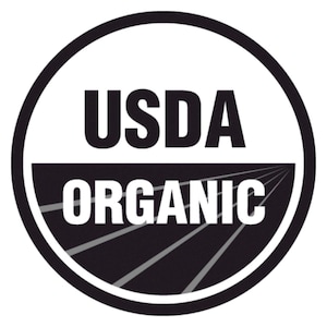 May include: A black and white USDA Organic seal with the text "USDA ORGANIC" in white letters.