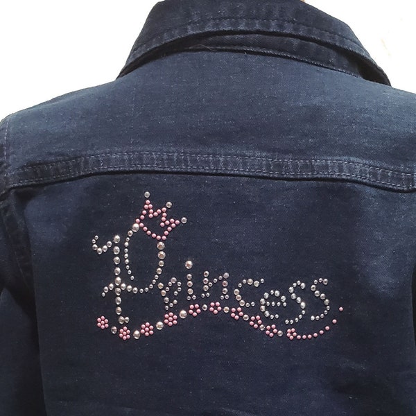 Kid's Metal Bling Princess denim jacket with long sleeves, pockets, and rhinestone buttons.