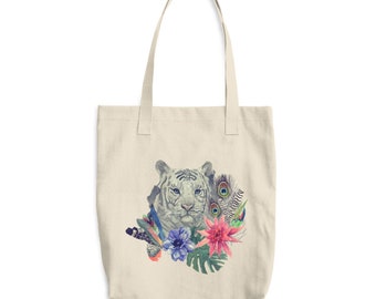 Bolsa de algodón con estampado de acuarela dibujado a mano de cabeza de tigre blanco, flores, plumas y hojas.