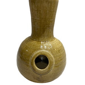 Large yellow pottery vase