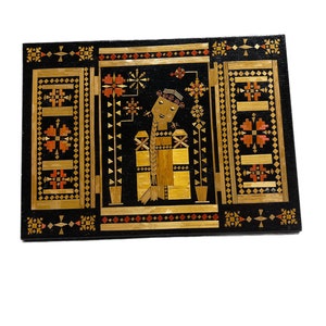 Black and orange Rapunzel wood folk art