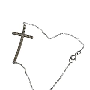 Delicate sterling silver and cubic zirconia cross bracelet