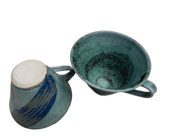 Pair of light blue with royal blue chevrons pottery coffee mugs