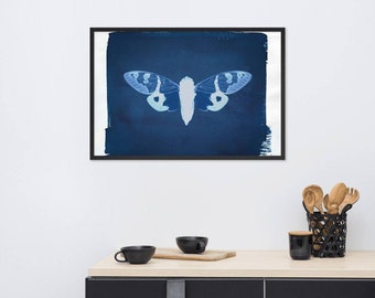 May include: A framed print of a blue and white cicada insect on a dark blue background.