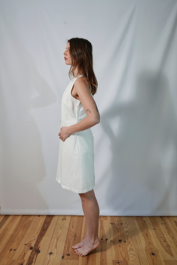 Robe blanche courte doublée à motifs sans manches "27 Quai de Seine". T