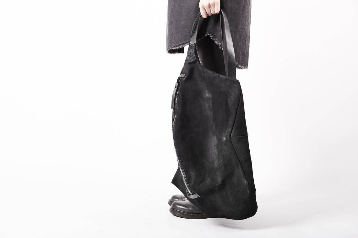 small black leather rucksack