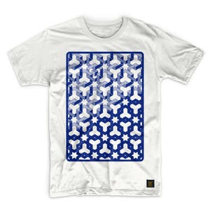 May include: White t-shirt with a blue geometric pattern printed on the front. The pattern is a repeating design of stars and squares.