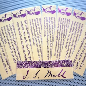 May include: A set of yellow bookmarks with purple accents featuring quotes by J.J. Mill. The quotes focus on the importance of individual thought and the need for a strong, well-informed society.