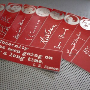 May include: Red bookmarks with white text and portraits. Each bookmark features a different name and signature. A rectangular card with the quote "Modernity has been going on for a long time" is also present.