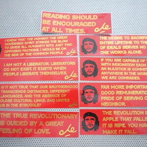 May include: Ten red rectangular stickers with yellow text and a small red star with the letters "che" in yellow. The text on the stickers includes quotes from Che Guevara, such as "Reading should be encouraged at all times." and "The true revolutionary is guided by a great feeling of love."