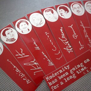 May include: Red bookmarks with white illustrations of people's faces and signatures. The bookmarks have the names of the people written in white script. A small red rectangle with white text reads "Modernity has been going on for a long time. C.H. Sisson."