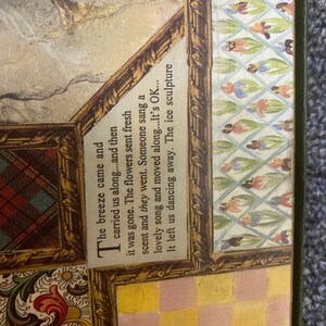 May include: A vintage-style framed collage featuring a chequered pattern, floral designs, and a text excerpt about a breeze carrying people along. The text reads: "The breeze came and carried us along...and then it was gone. The flowers sent fresh scent and they went. Someone sang a lovely song and moved along...It's OK...It left us dancing away. The ice sculpture"