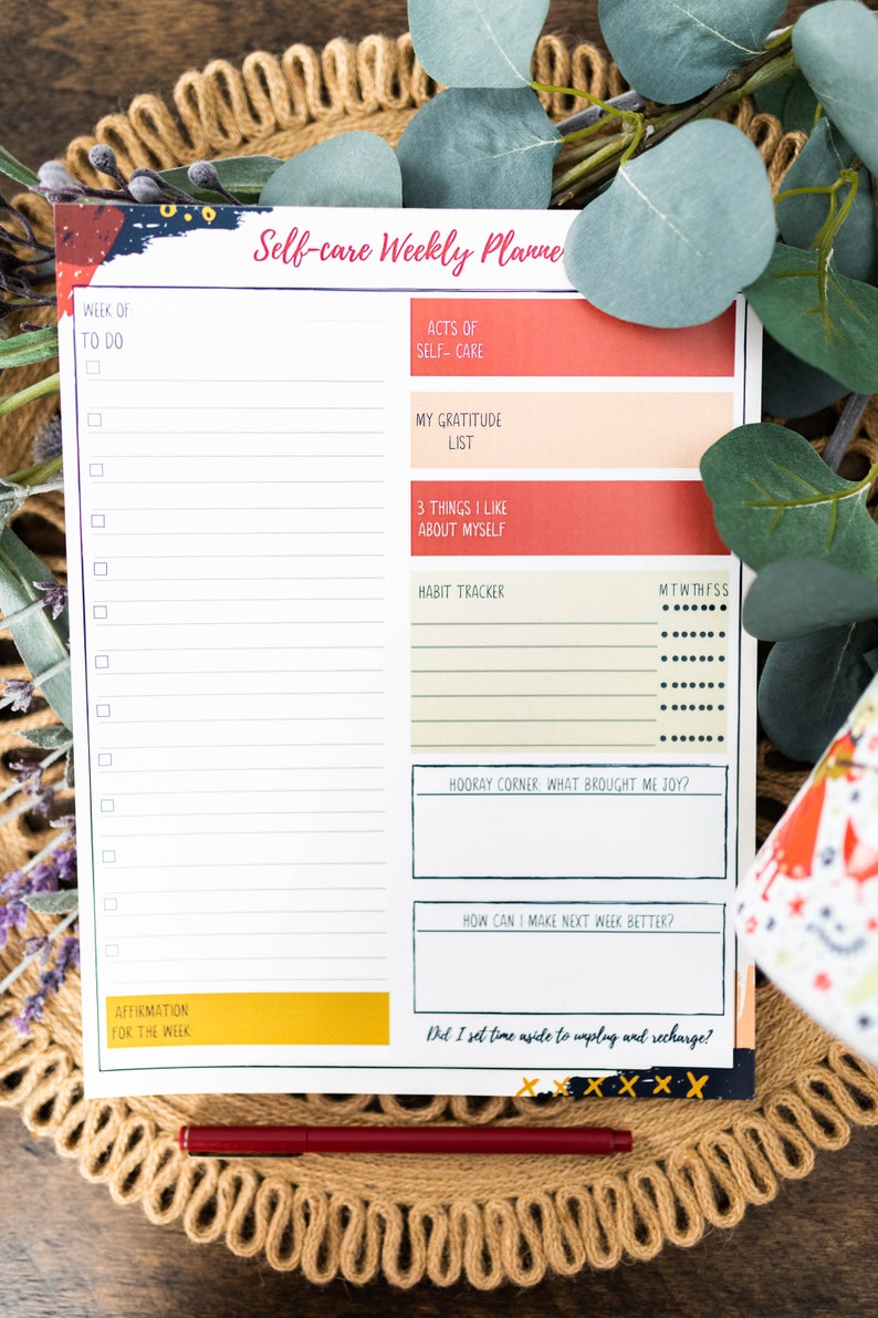 May include: A printable self-care weekly planner with sections for to-do lists, acts of self-care, a gratitude list, things you like about yourself, a habit tracker, a hooray corner, how to make next week better, and an affirmation for the week. The planner has a colorful abstract design.