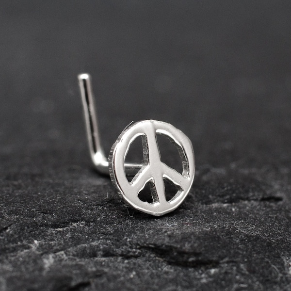 Peace sign hand cut sterling silver nose stud. Tiny peace symbol piercing. Unique Hippie nose piercing. Hippie nose stud. Symbol piercing..