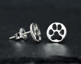 Dogs paw hand cut sterling silver stud earrings. Dog lover gift. Tiny dogs paw studs. Holiday earrings gift. Silver dog studs.