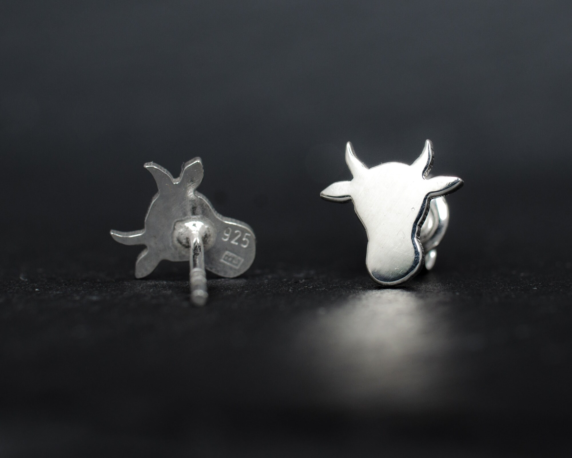 Cow head silhouette sterling silver stud earrings. Hand cut tiny cow studs. Cowgirl gift. Bull earrings. Silver bull studs. Cowboy gift.