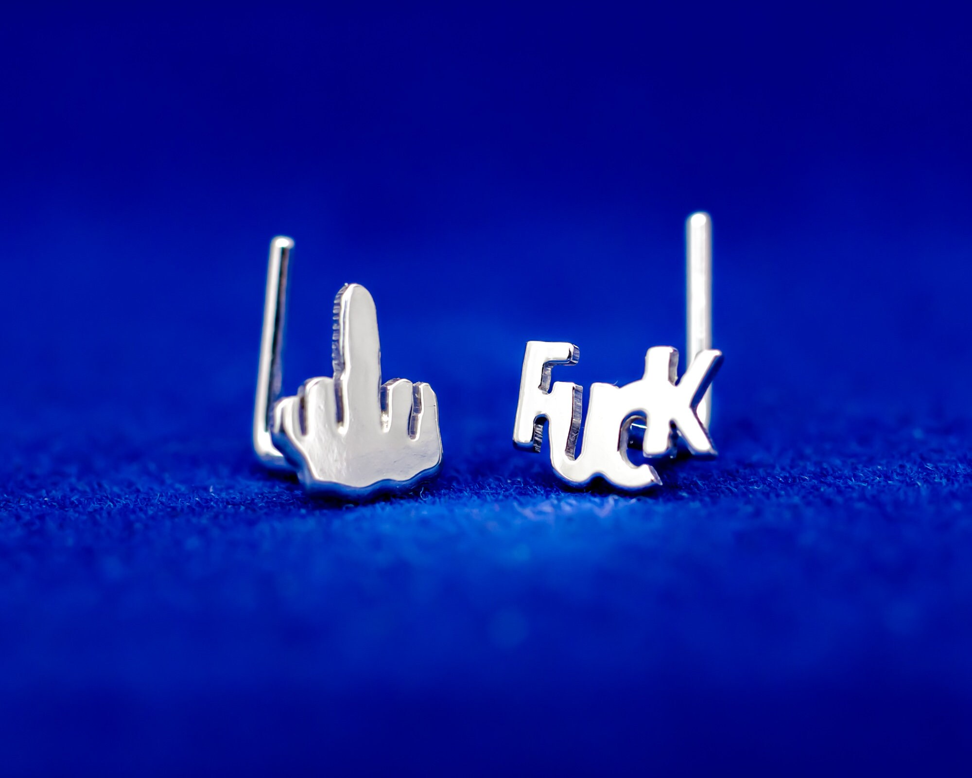 Middle finger nose best sale ring