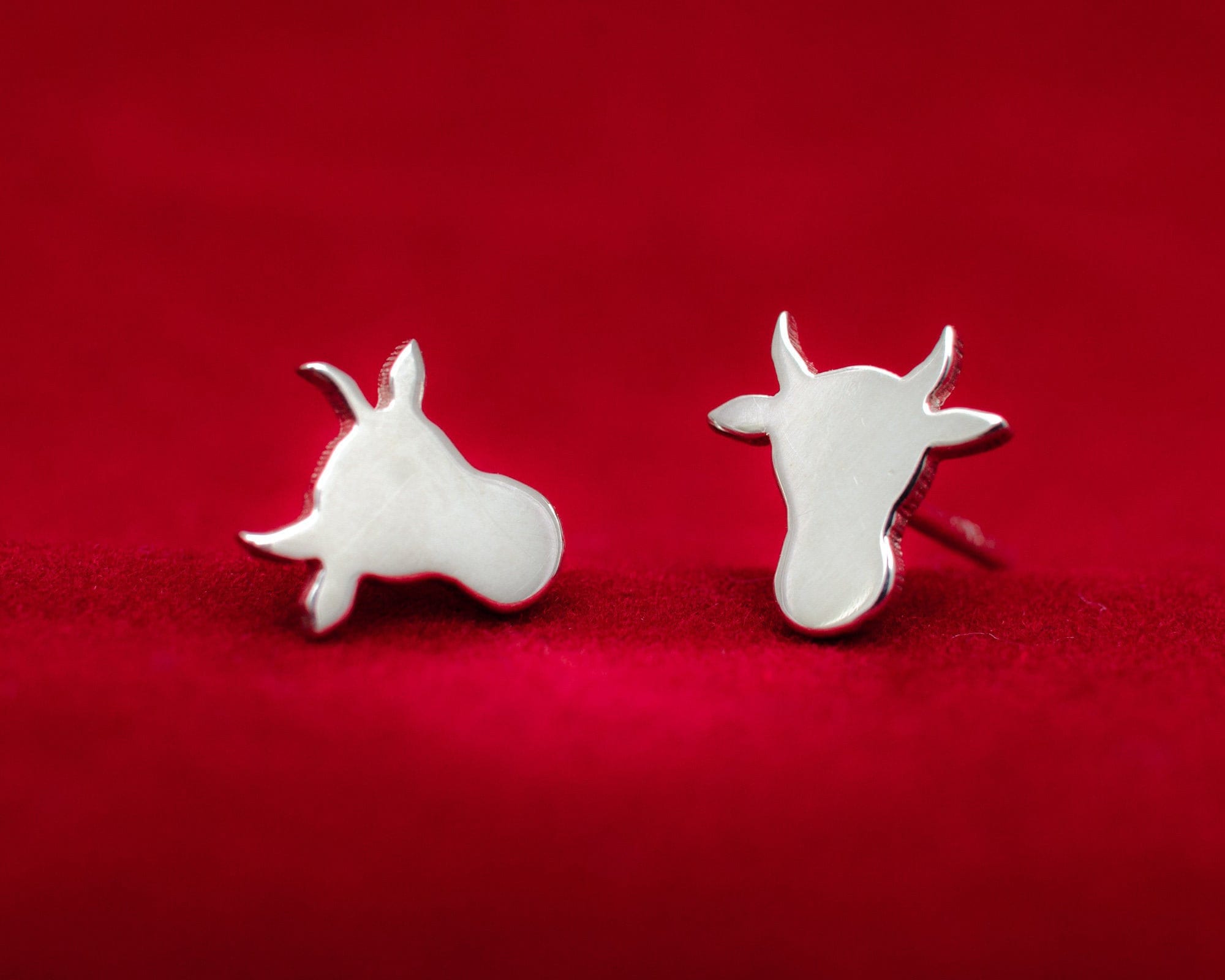 Cow head silhouette sterling silver stud earrings. Hand cut tiny cow studs. Cowgirl gift. Bull earrings. Silver bull studs. Cowboy gift.