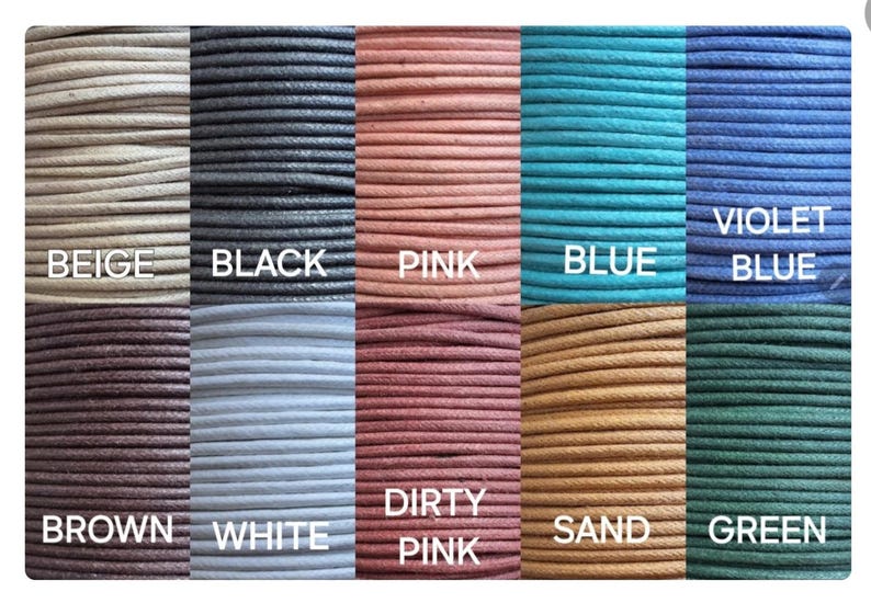 May include: A color chart of waxed cord in various colors, including beige, black, pink, blue, violet blue, brown, white, dirty pink, sand, and green. Each color is labeled with its name.