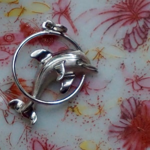 Beautiful Vintage 90s Silver Tone Metal Dolphin Pendant Charm. Lovely Stylish Vintage 90s Silver Tone Metal Dolphin Through Ring Pendant