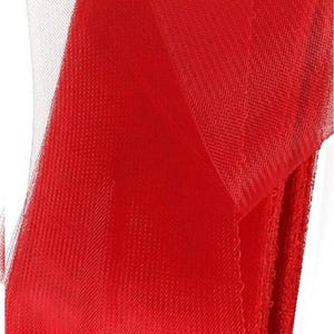 May include: Red tulle fabric, a sheer, lightweight material with a fine mesh texture. The fabric is folded in half, showing the red color and the mesh pattern.