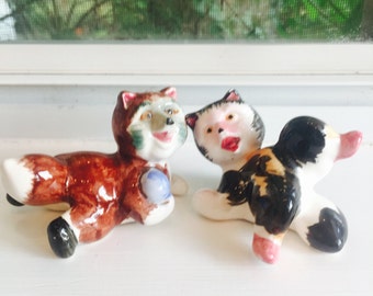 Anthropomorphic Fighting Fox and Skunk Salt and Pepper Shakers made in Japan circa 1950s