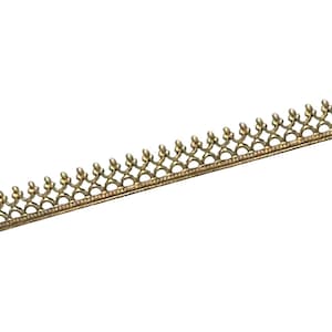 May include: A decorative, antique-style brass trim with an ornate, repeating pattern. The trim features a series of small, rounded elements along the top edge and a delicate, openwork design. Ideal for embellishing crafts or adding a vintage touch to projects.
