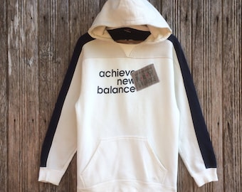 ¡Excepcional! Sudadera con capucha New Balance, diseño elegante, unisex, talla mediana.