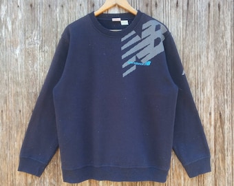Sudadera New Balance con logo grande, bonito diseño, unisex, talla mediana.