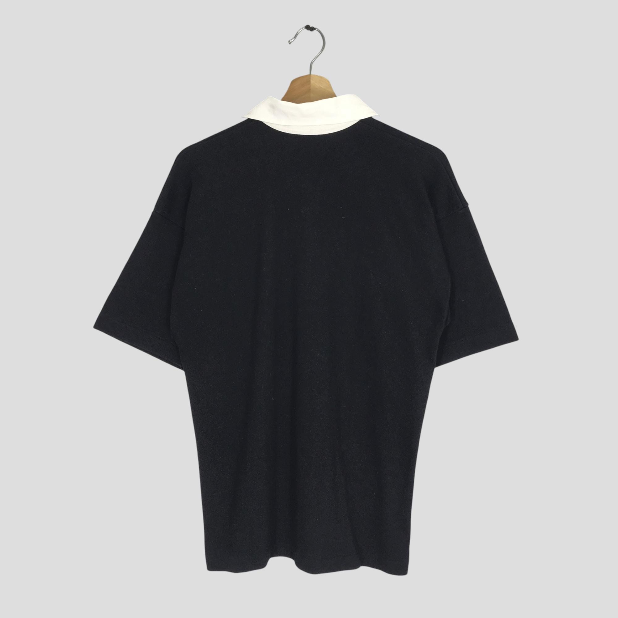 Vintage 90's Canterbury of New Zealand All Black Polo Shirt