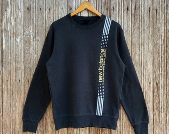 ¡Excepcional! Sudadera New Balance unisex talla mediana.