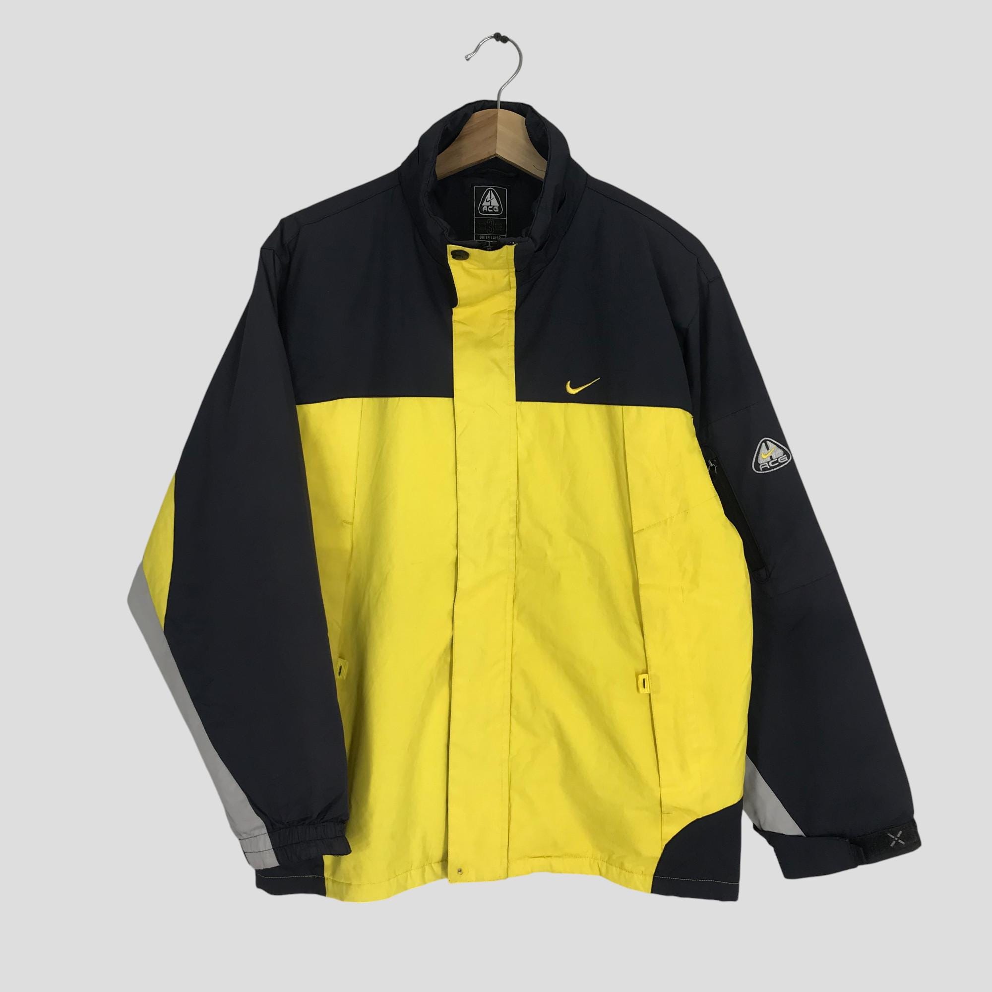 yellow nike wind breaker