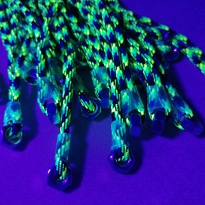 FPSN17G Paracord Flogger 17 UV green, black and blue looped with nuts and green handle for BDSM impact play lots of sting image 7