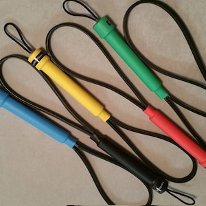 May include: Five colorful adjustable camera straps with black loops. The straps are blue, yellow, green, red, and purple.