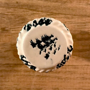 White ceramic distressed round pie knob + black speckles and silver steel hardware