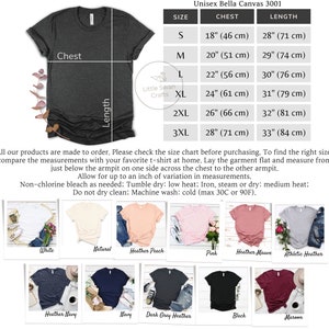 May include: A size chart for unisex t-shirts, showing different sizes and corresponding chest and length measurements in inches and centimeters. The chart also includes a list of available colors for the t-shirts, including white, natural, heather peach, pink, heather mauve, athletic heather, heather navy, navy, dark grey heather, black, and maroon.