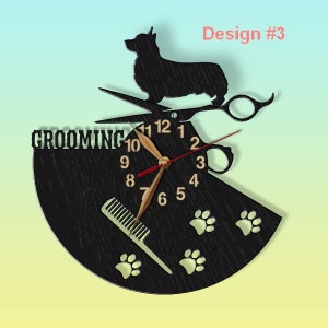 May include: A black wooden clock with a dog silhouette, scissors, and a comb. The clock face has Roman numerals and paw prints. The text "Grooming" is on the clock face. Design #3.
